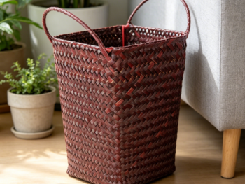 Double-handled straw woven coffee-colored basket, fruit and towel storage